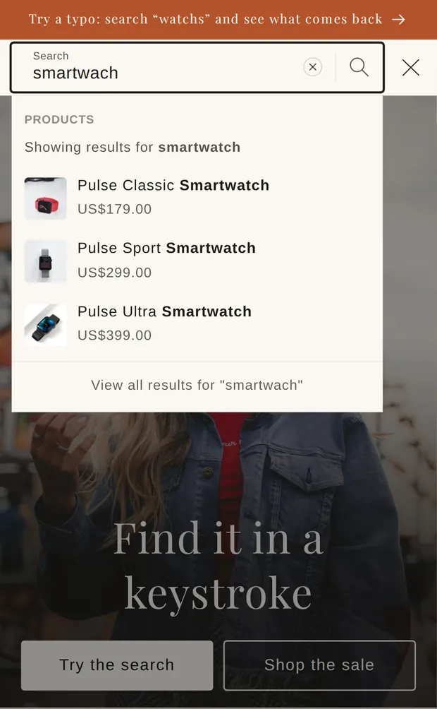 On a phone, “smartwach” typed into the search box; the dropdown says “Showing results for smartwatch” and lists three smartwatches.